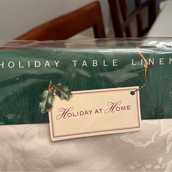 New in package. Ivory/cream 52”x70” oblong tablecloth. - Picture 3 of 5